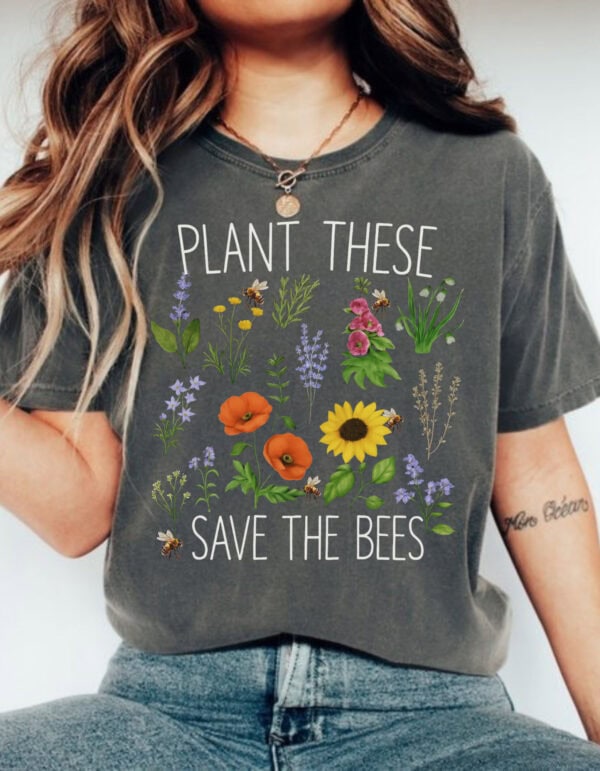 Unisex espresso brown 'Plant These Save the Bees' t-shirt by Tamarack Atlantic featuring wildflower graphic and Comfort Colors relaxed fit – eco-conscious organic gardening apparel