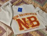 NB Maritimer Crewneck with Varsity style letters New Brunswick Gold and Red