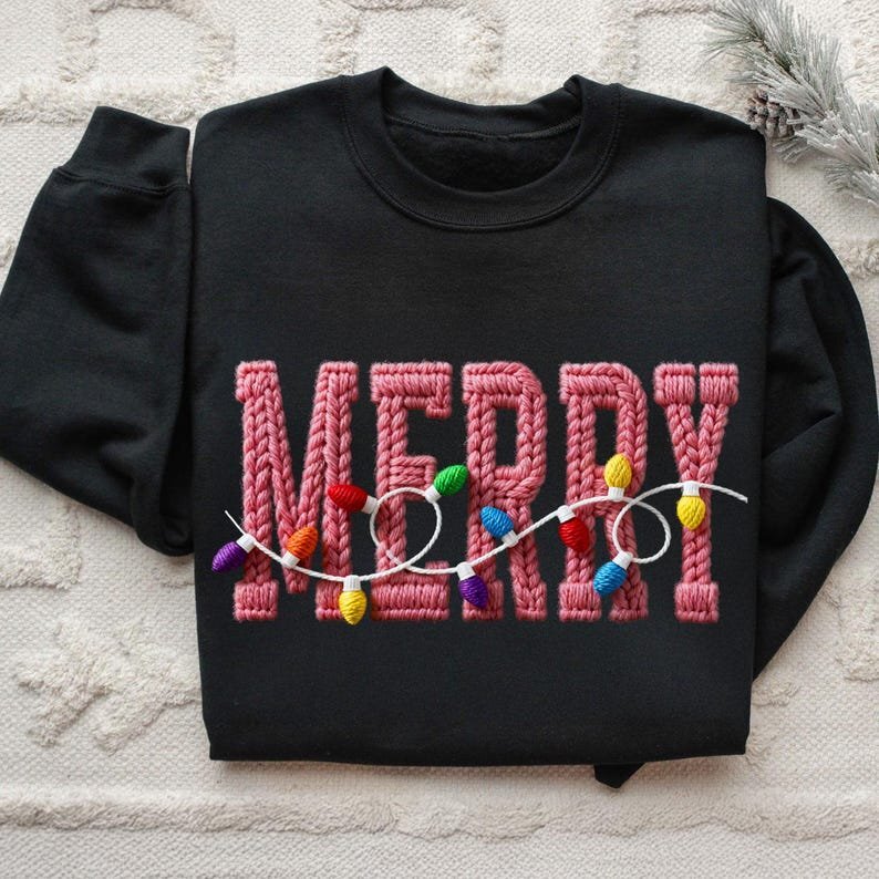 2025/11/1000121627.jpg Merry Yarn Crewneck - Image 1