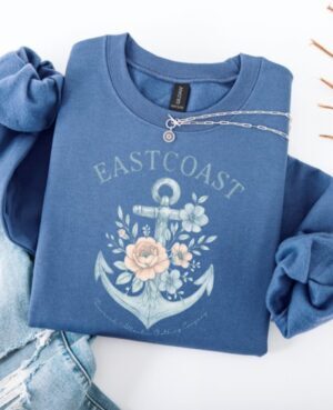 Coastal Comfort Crewneck indigo blue. Crewneck for comforting the soul , comfort you can feel inssode out. Eastcoast design with soft palettes featuring an anchor and floRAL DESIGN.