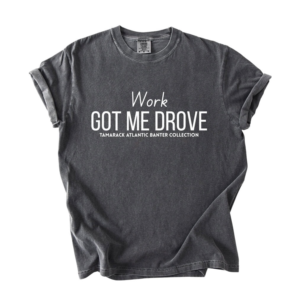 2026/02/1000156930-scaled.jpg Work Got Me Drove Comfort Tee - Image 1